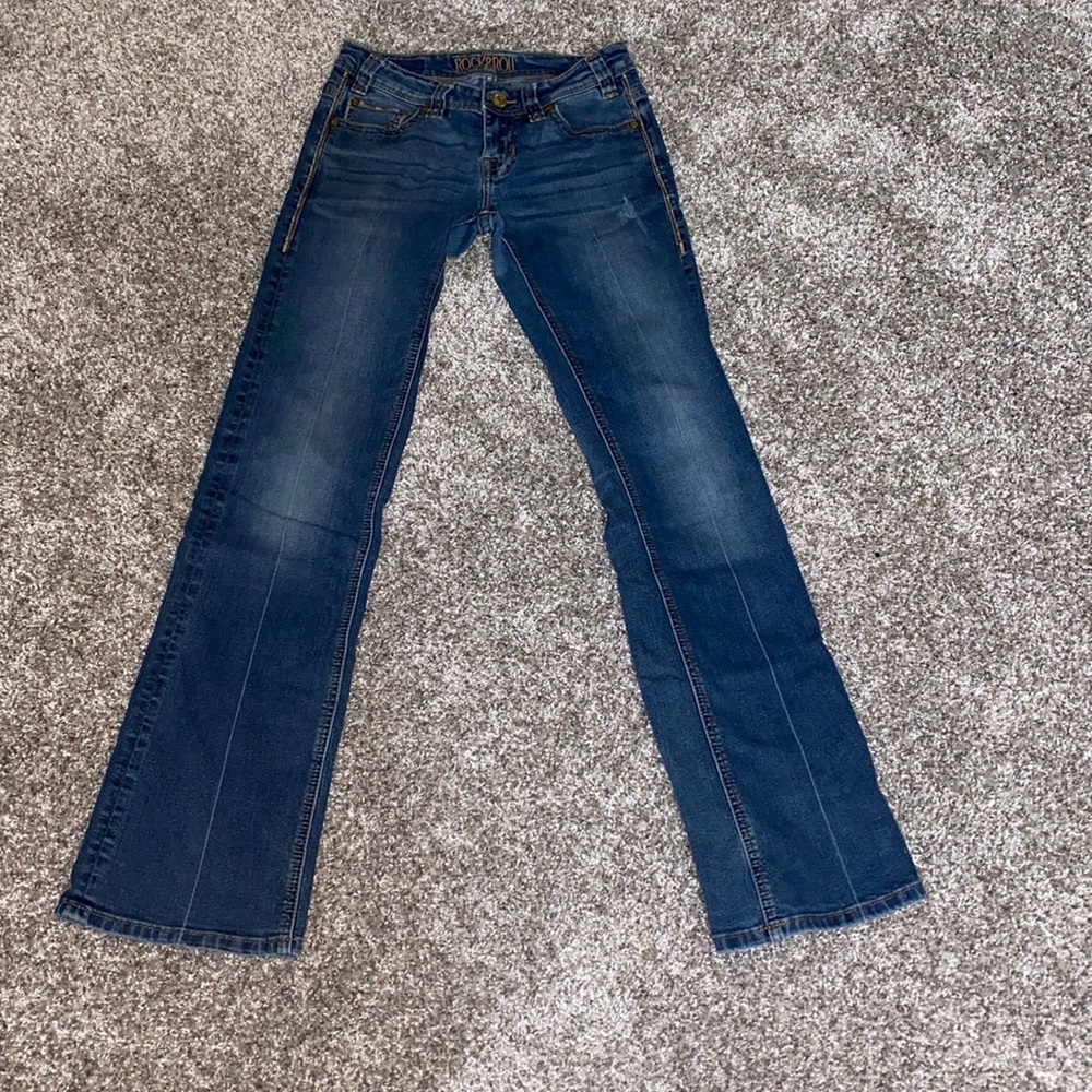 Rock and Roll cowgirl riding jeans